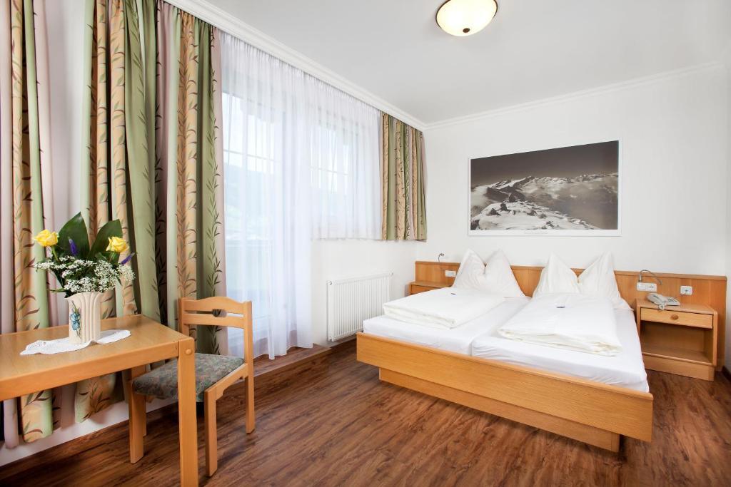 Hotel Grundlhof Bramberg am Wildkogel Quarto foto